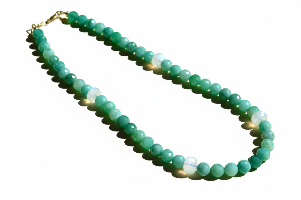 Green beaded necklace on a white background. 14K gold necklace with natural emeralds and moonstones beaded gemstone jewelry untreated emeralds OpalOra luxury