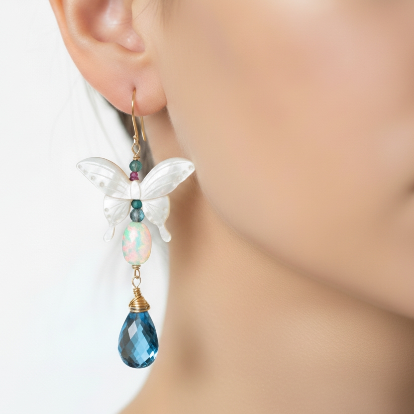 Opal, Swiss Blue topaz briolette drops, Mother of Pearl butterfly Earrings in 14K solid Gold. Handmade earrings by opalora jewelry. Long butterfly earrings, gold earrings.