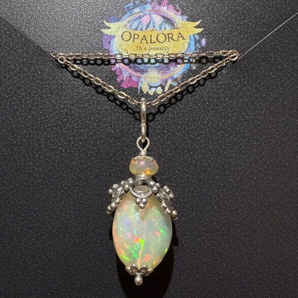Rainbow opal talisman pendant sterling silver angelic charm handcrafted jewelry with color flash OpalOra Black Hills