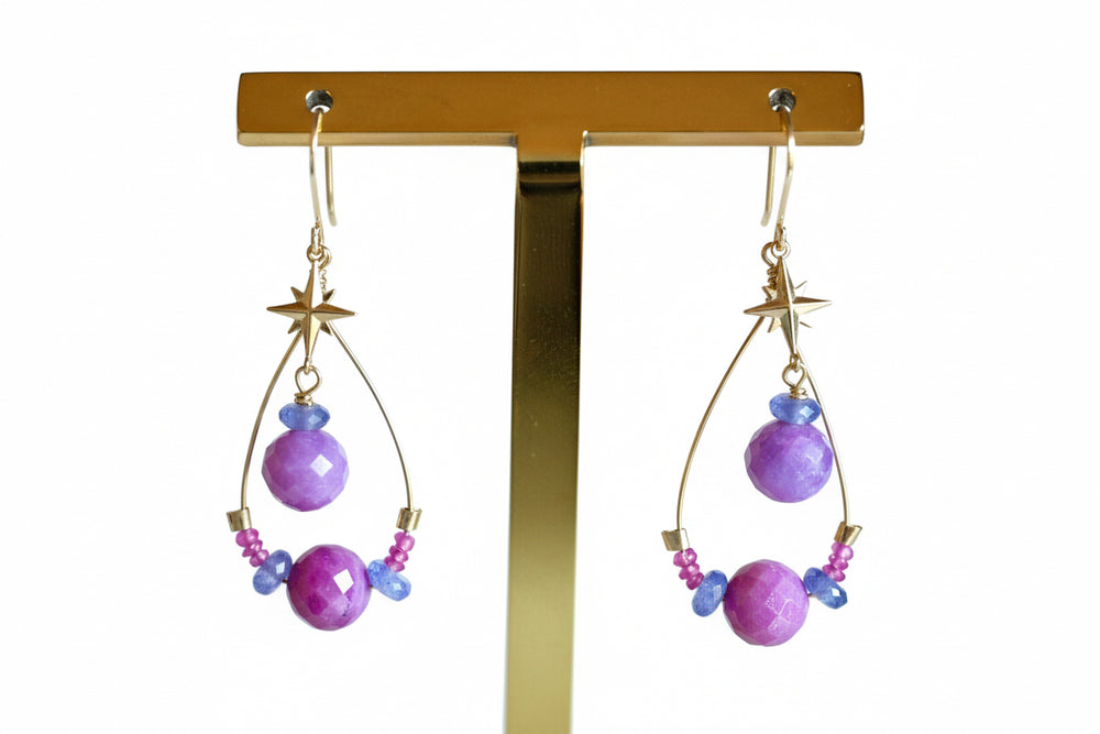 Close-up of natural untreated ruby stars with tanzanite beads and solid 14K gold accents