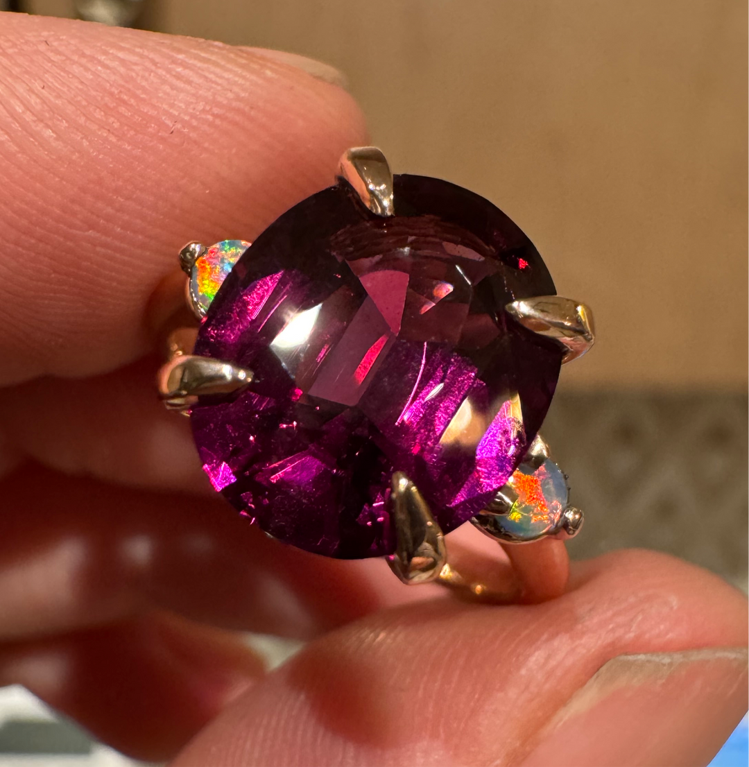 Large Burgundy umbalite garnet engagement ring with Australian opal accents in rose gold