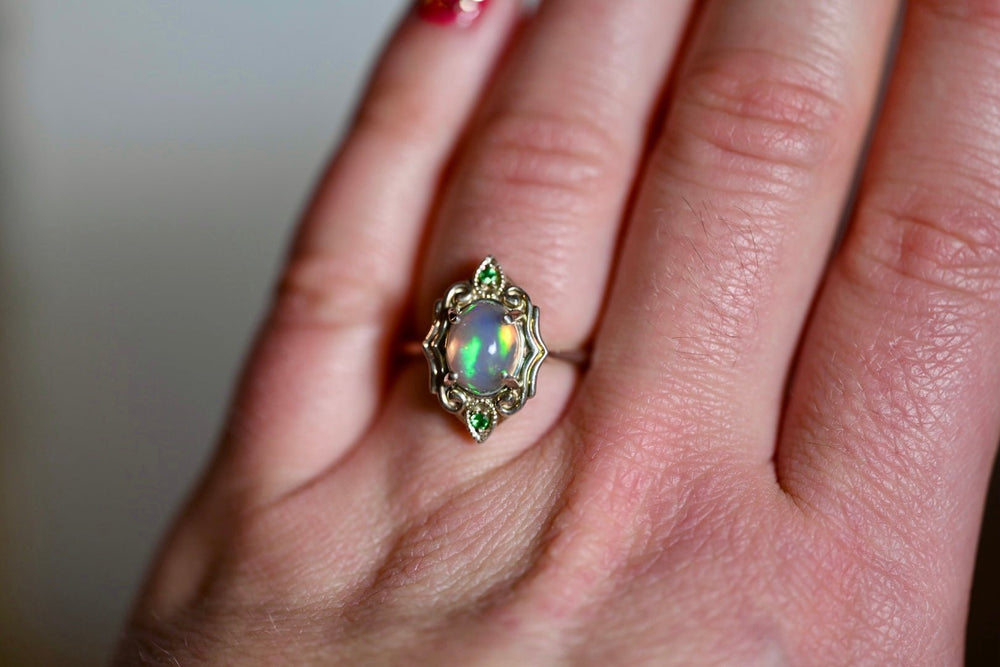 wearing the Art Deco Green Opal Ring with Gemmy Tsavorite Garnets - Sterling Silver - OpalOra Jewelry. Art Deco opal ring green tsavorite garnet sterling silver statement ring vibrant gemstones OpalOra jewelry