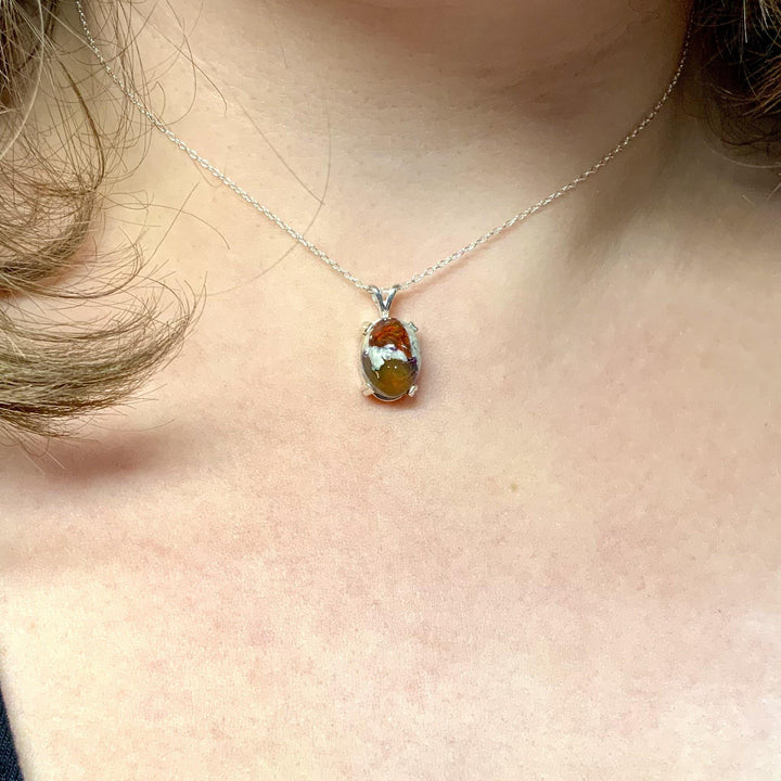 Wearing Ancient Fires Mexican Galaxy Opal Pendant. Mexican fire opal pendant black galaxy opal 12mm sterling silver necklace chain included handcrafted OpalOra