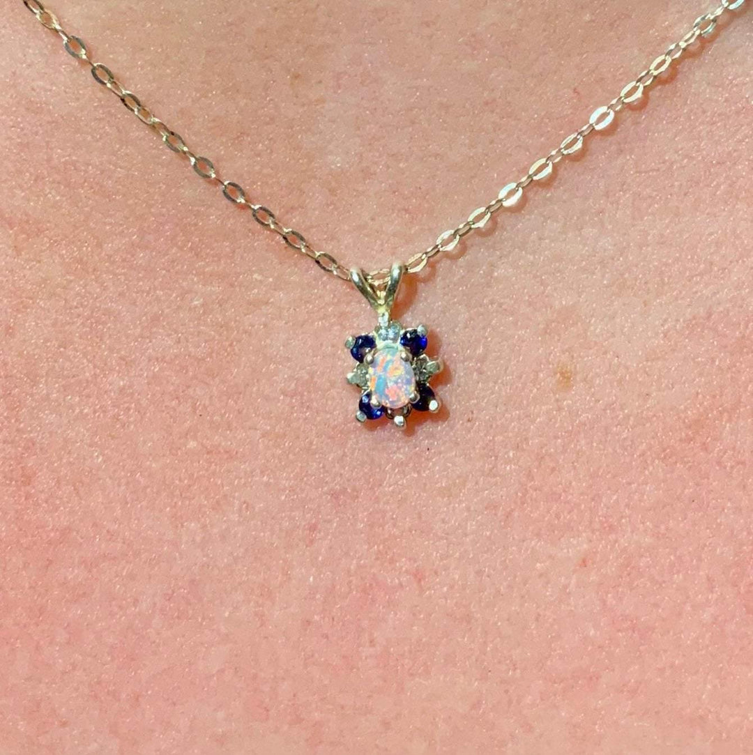OpalOra Australian opal pendant with blue sapphires, sunburst halo design in sterling silver