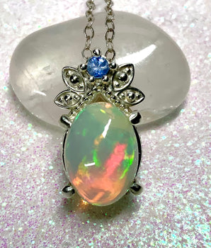 Peacock Blue Opal and Sapphire Pendant.