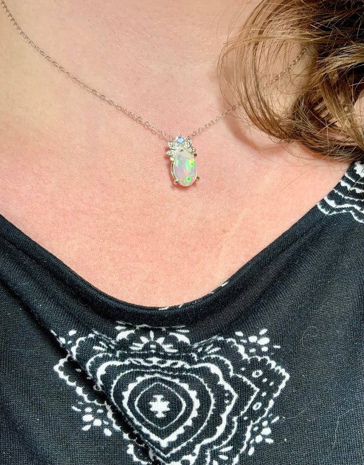 Peacock Blue Opal and Sapphire Pendant.